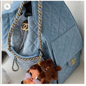 CHANEL 25 Denim Shoulder Bag with Gold Chain